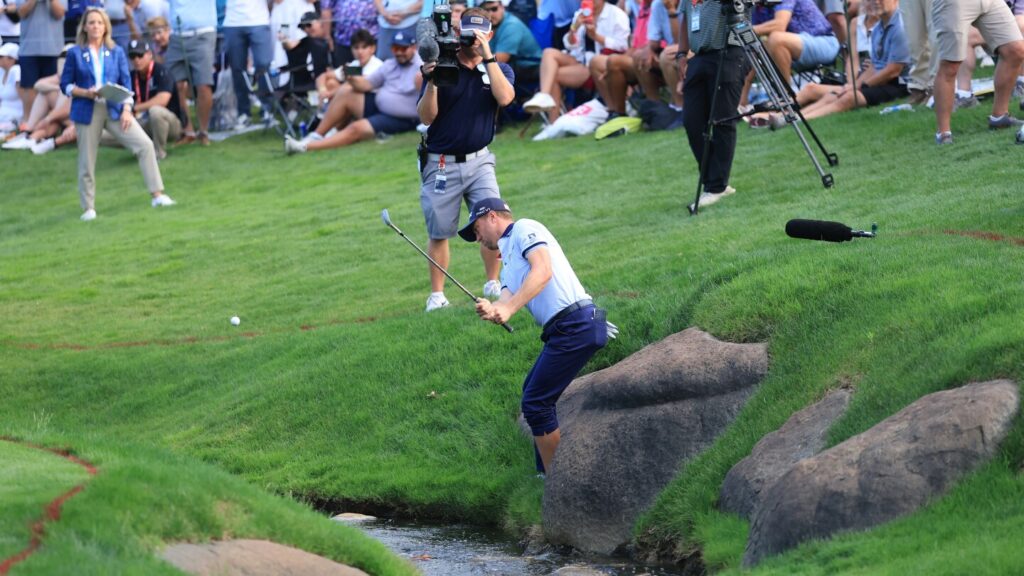 Justin Thomas’ wild round at PGA ends with shoes and socks off at 18th hole