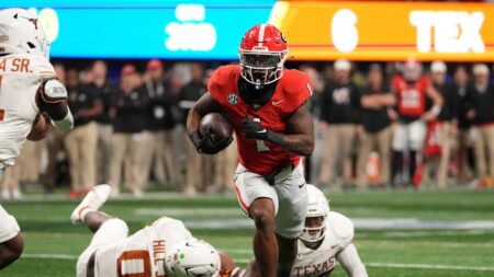 Panthers sign fourth-round pick Trevor Etienne
