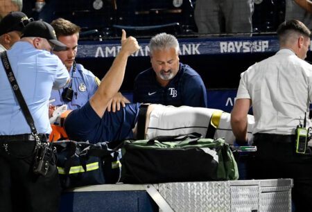 Rays pitcher Hunter Bigge taken from field on cart after being struck in dugout by foul ball vs. Orioles