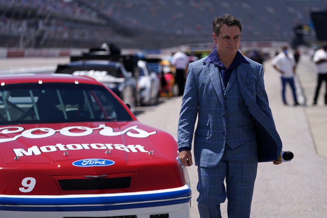 May 9, 2021; Darlington, South Carolina, USA; Fox Sports analyst and former NASCAR driver Jeff Gordon walks on pit road prior to the Goodyear 400 at Darlington Raceway. Mandatory Credit: Jasen Vinlove-USA TODAY Sports