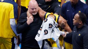 Pacers’ Tyrese Haliburton forced to leave Game 7 with apparent serious lower leg injury