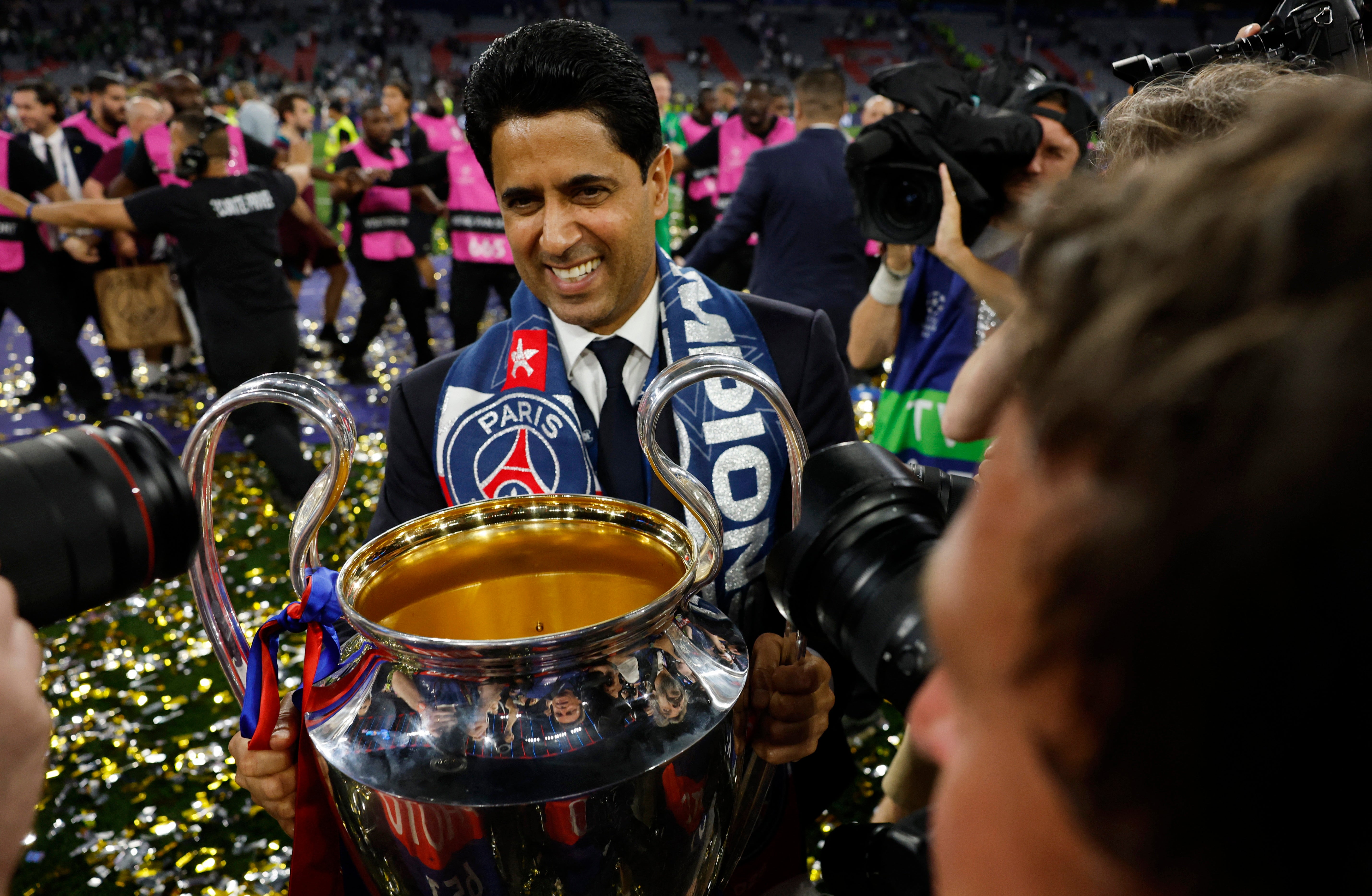 Nasser Al-Khelaifi holds the Champions League trophy