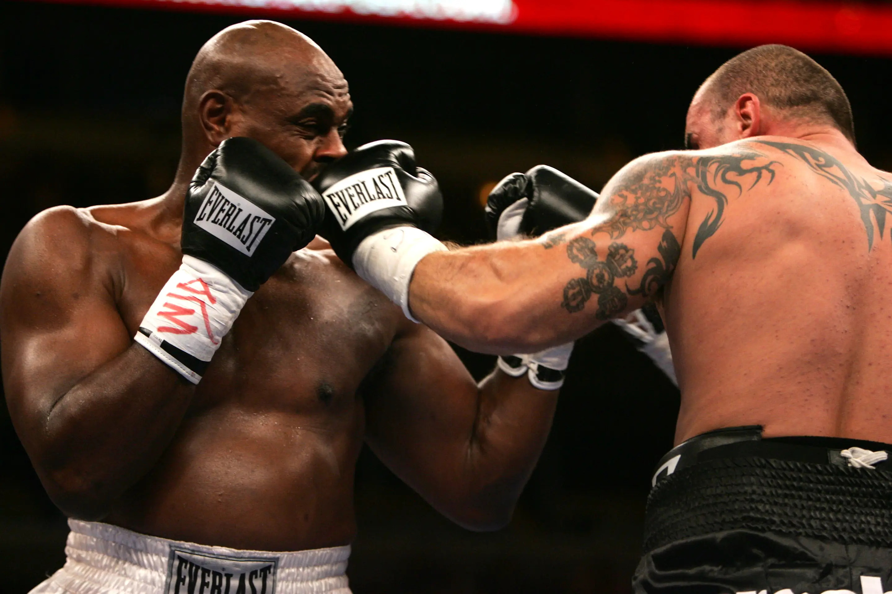 CHICAGO - AUGUST 13:  Przemyslaw Saleta lands a punch against Oliver McCall in the Special Heavyweight attraction on August 13, 2005 at the United Center in Chicago, Illinois.  (Photo by Jonathan Daniel/Getty Images)
