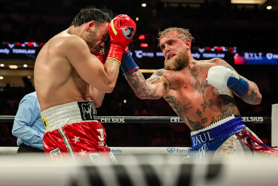 Jake Paul punches Julio César Chávez Jr. during their cruiserweight boxing match on Saturday at the Honda Center.