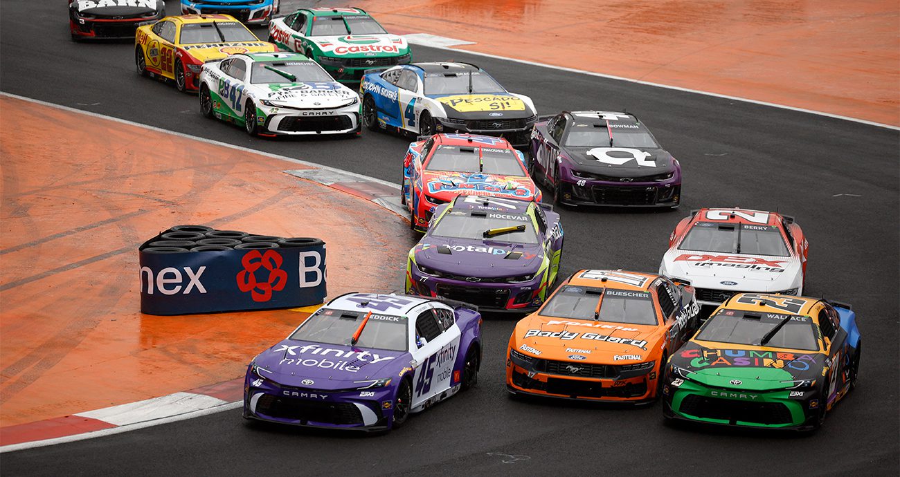 cars race on track in mexico city