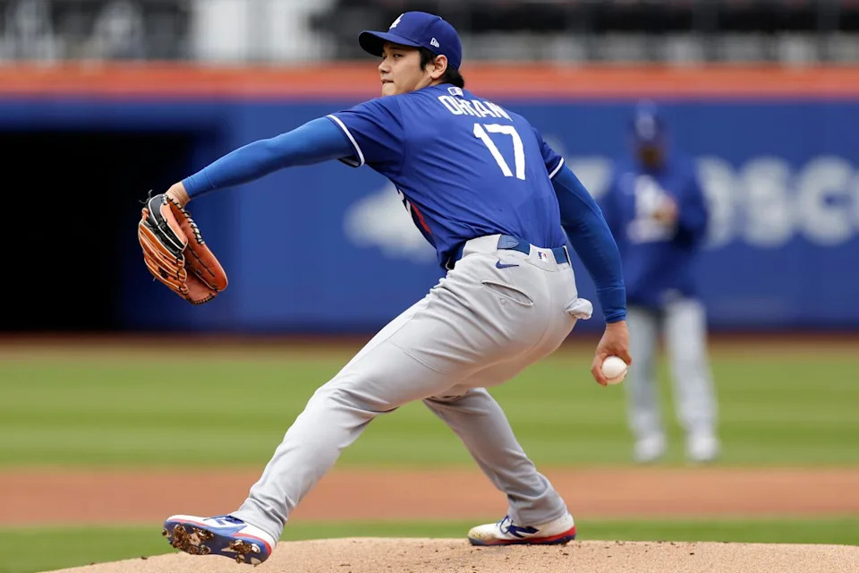 Dodgers' Shohei Ohtani throws live batting practice before a baseball game against the New York Mets.