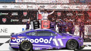 Denny Hamlin throws up O-H after winning Michigan NASCAR race