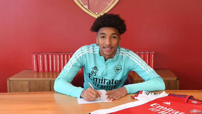 Former Gunner signs for Plymouth Argyle after terrible time in Germany 4 Bradley Ibrahim signing his professional contract with Arsenal (Photo via Arsenal.com)