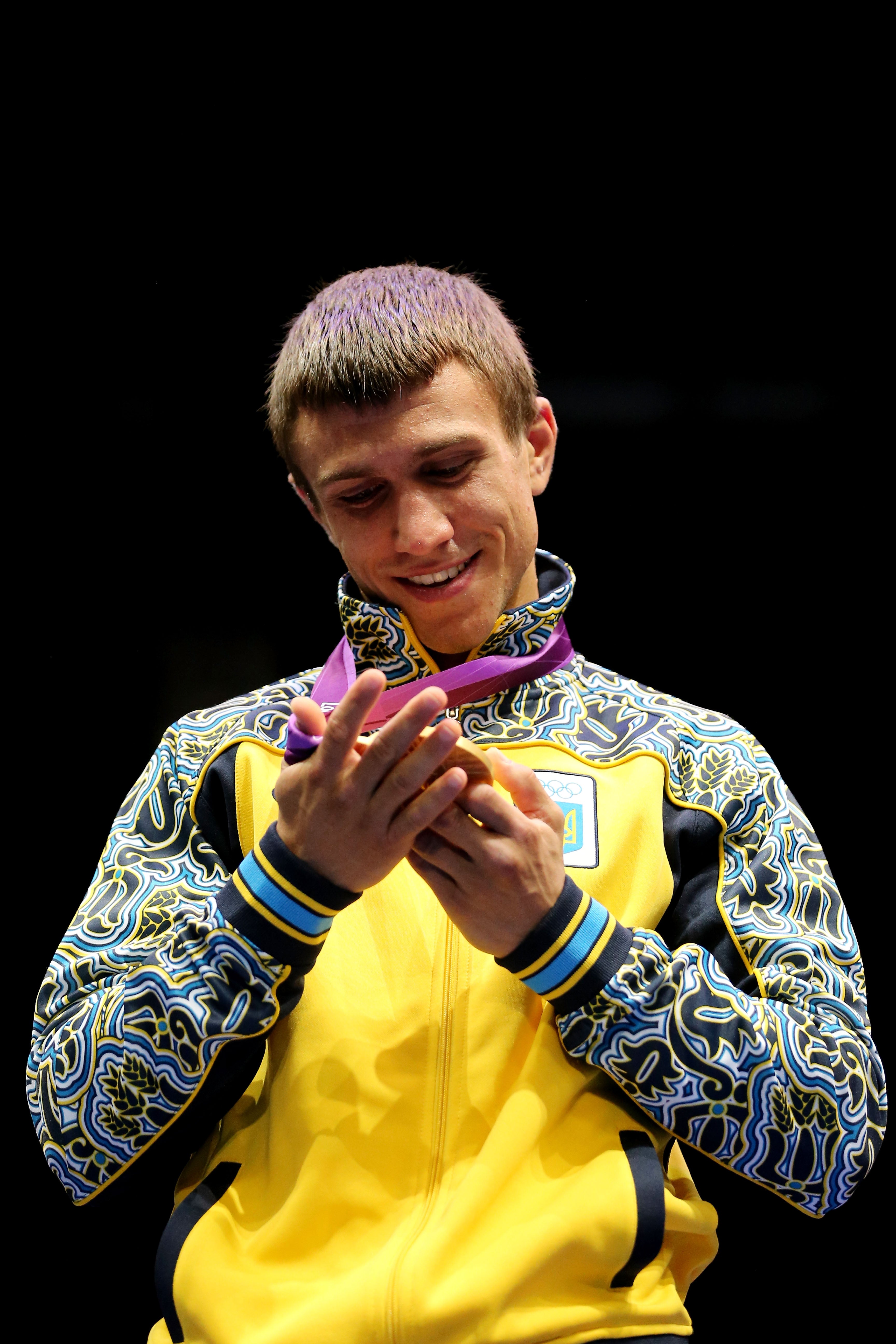Lomachenko celebrates his second Olympic gold medal, at London 2012