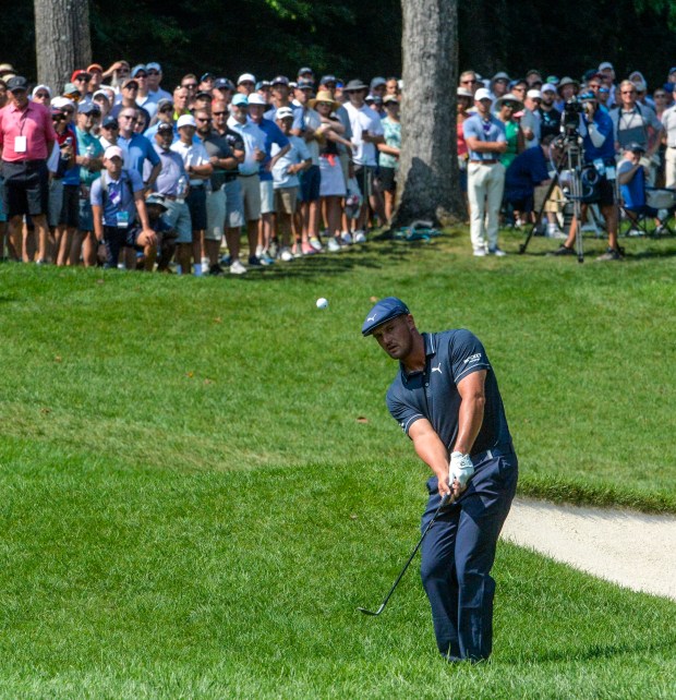 Bryson DeChambeau of the United States plays his second shot on the first hole during the second round of the BMW Championship at Caves Valley Golf Club on August 27, 2021 in Owings Mills, Maryland.