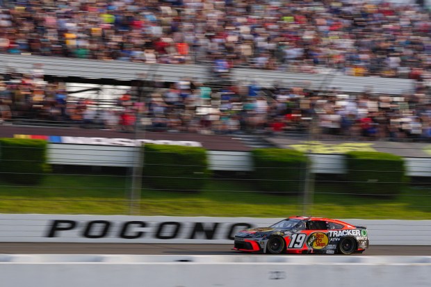 Chase Briscoe drives down the front stretch during a NASCAR Cup Series auto race at Pocono Raceway, Sunday, June 22, 2025, in Long Pond, Pa. (AP Photo/Derik Hamilton)