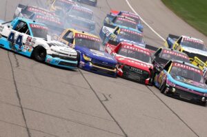 12 drivers crash in frenzied NASCAR Truck restart melee at Michigan