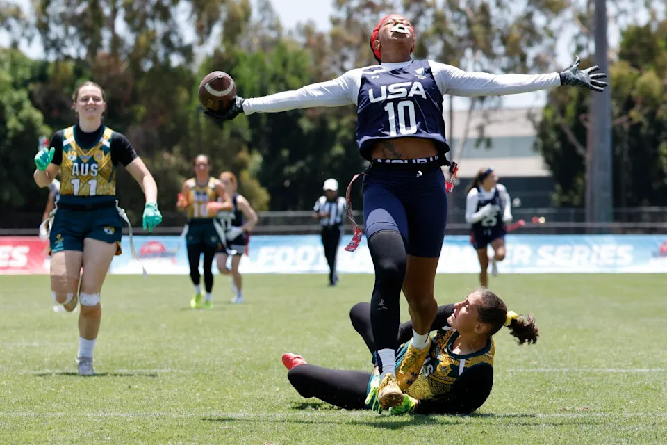 U.S. wide receiver Amber Clark-Robinson scores a touchdown against Australia