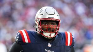 Patriots OL Mike Onwenu limited by hand injury