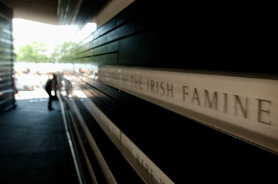 Text on a wall in the entrance to The Irish Hunger Memorial, 16 July 2002, in Battery Park, New York. The Memorial was created by artist Brian Tolle and is designed to remember events that led to the Irish famine of 1845-52 when 1.5 million were lost due to death or emigration. AFP PHOTO/Stan HONDA (Photo by STAN HONDA / AFP) (Photo by STAN HONDA/AFP via Getty Images)