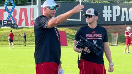 NC State football coach Dave Doeren makes hole-in-one