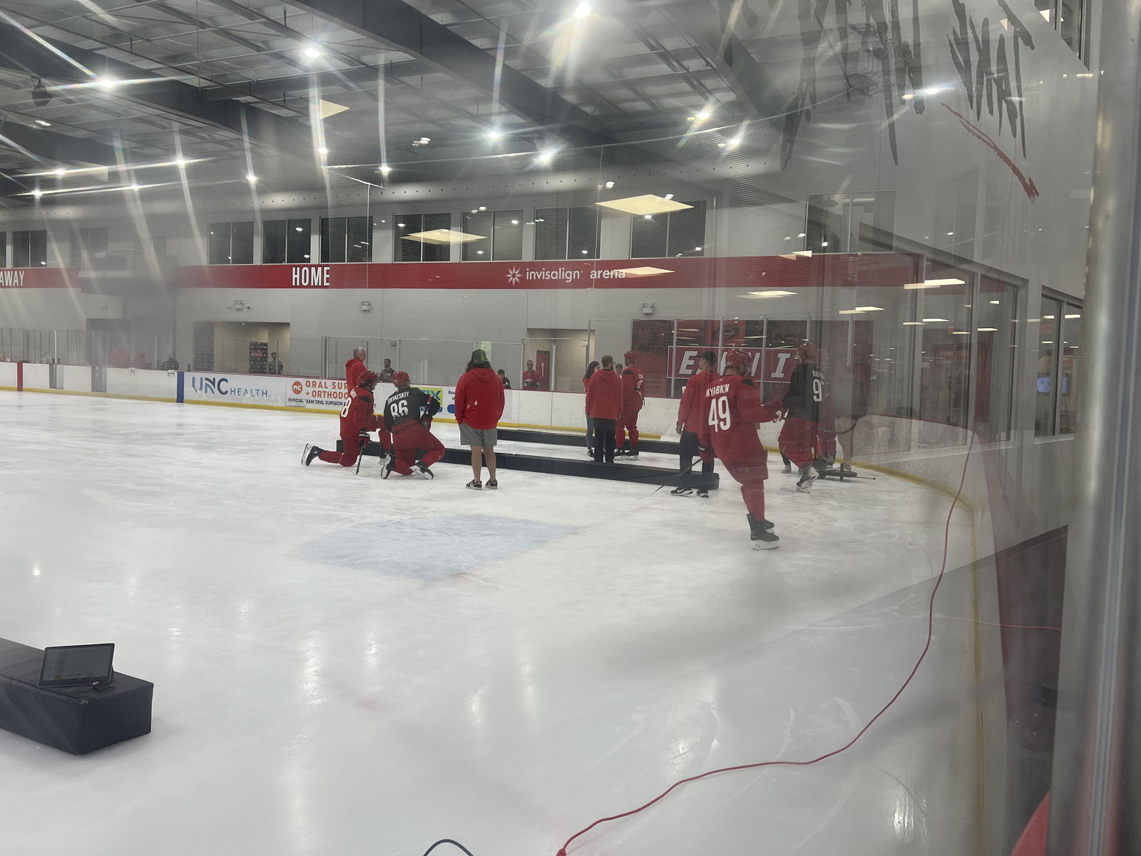 The Hurricanes' Russian prospects listen in to instructions for testing.