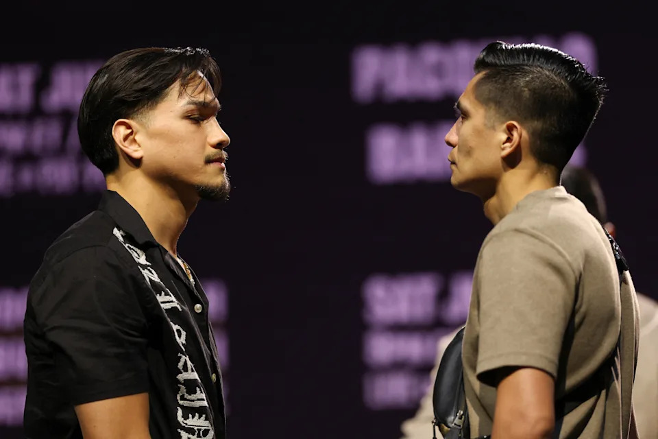 US boxers Brandon Figueroa (L) and Joet Gonzalez (R) face off during the press conference ahead of their July 19 WBC featherweight title fight at the NOVO at L.A. Live in Los Angeles on June 3, 2025. (Photo by Patrick T. Fallon / AFP) (Photo by PATRICK T. FALLON/AFP via Getty Images)