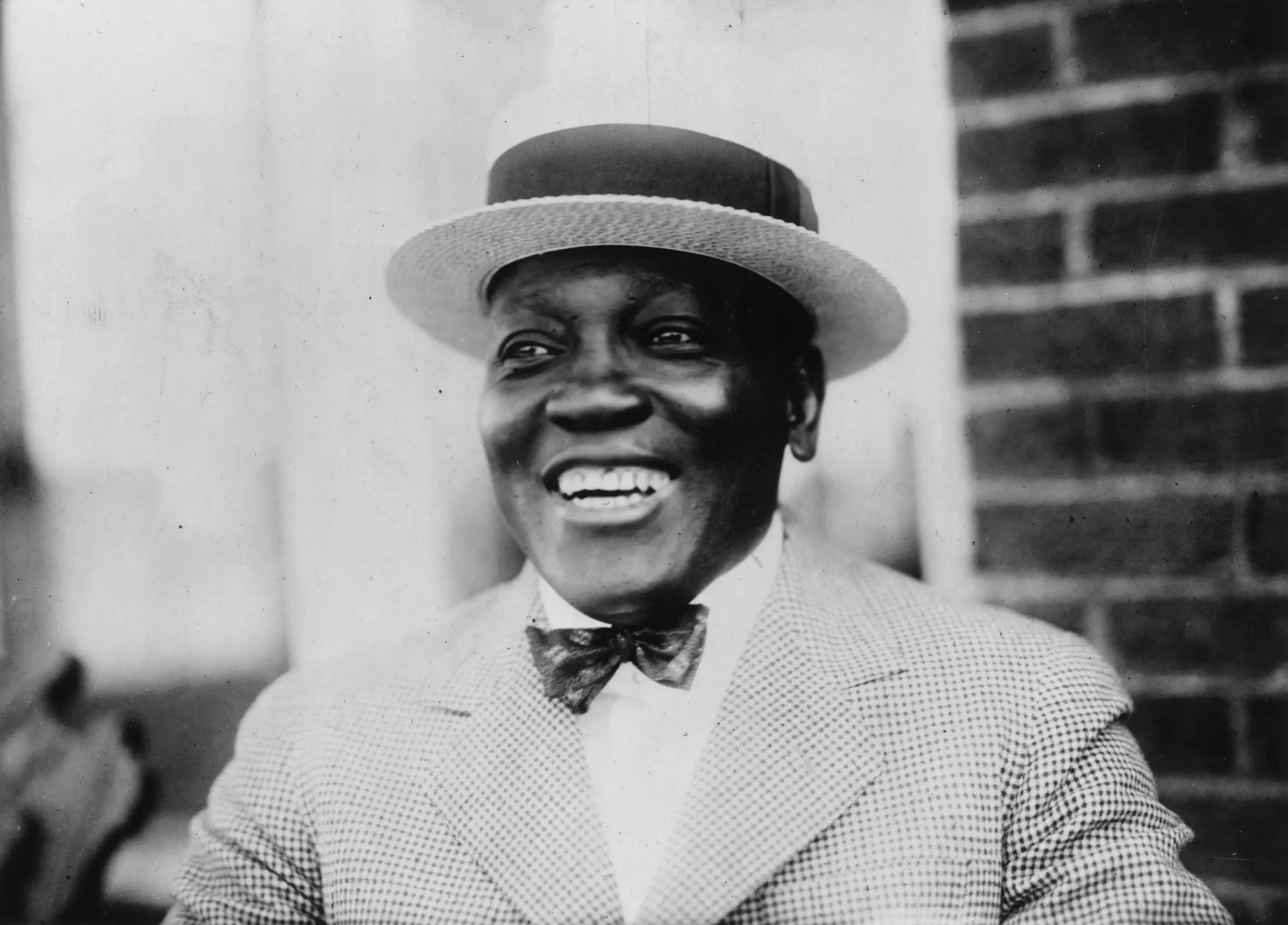 circa 1910: African-American boxer, Jack Johnson (1878 - 1946), he became World Heavyweight Champion in 1908 and defeated a series of 'great white hopes' who challenged him. (Photo by MPI/Getty Images)