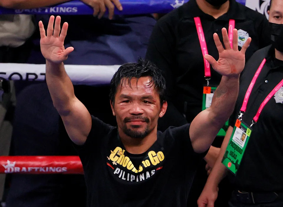 LAS VEGAS, NEVADA - AUGUST 21:  Manny Pacquiao gestures to fans after his WBA welterweight title fight against Yordenis Ugas at T-Mobile Arena on August 21, 2021 in Las Vegas, Nevada. Ugas retained his title by unanimous decision.  (Photo by Ethan Miller/Getty Images)