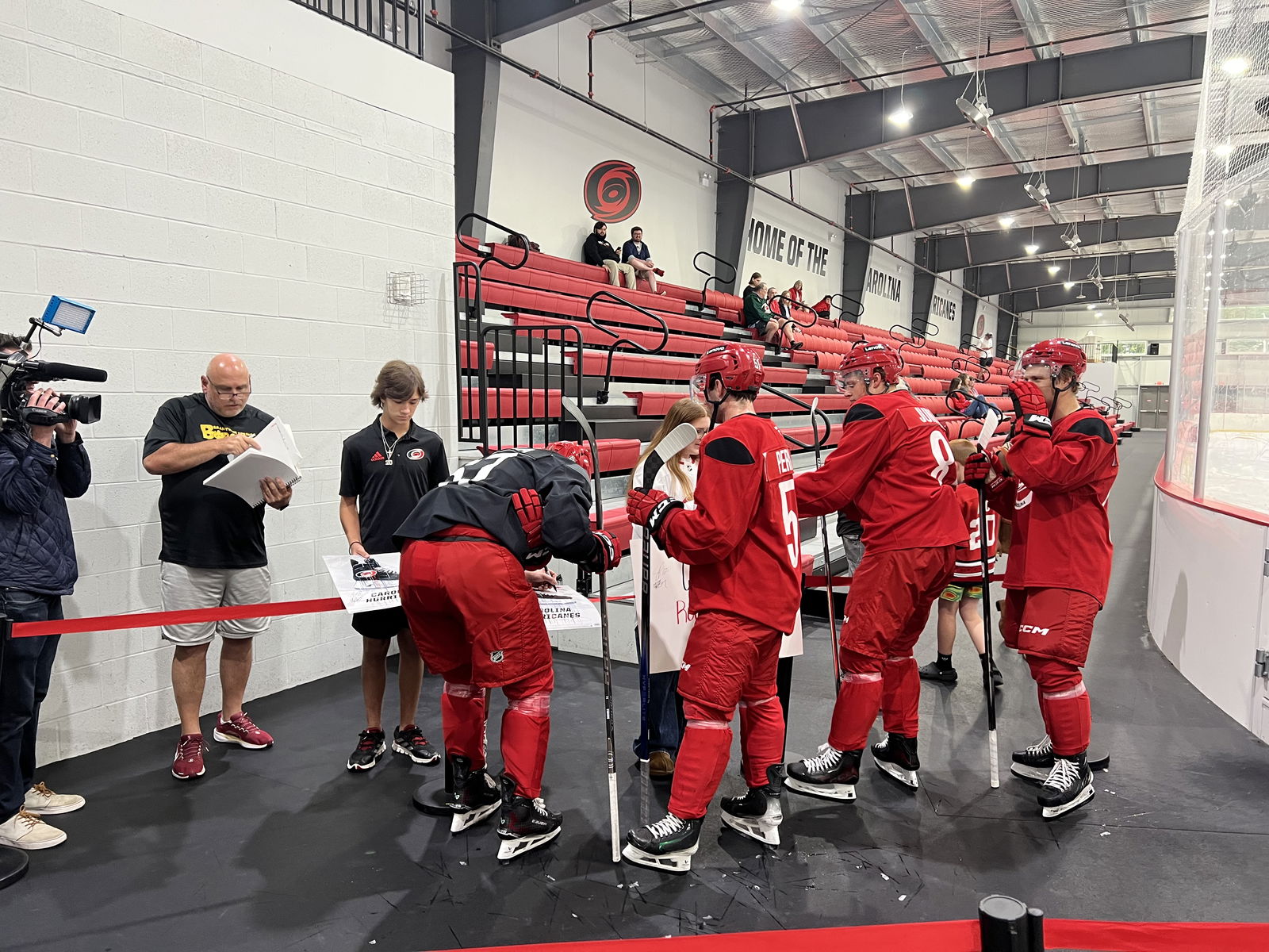 A few Carolina prospects sign some autographs for fans.