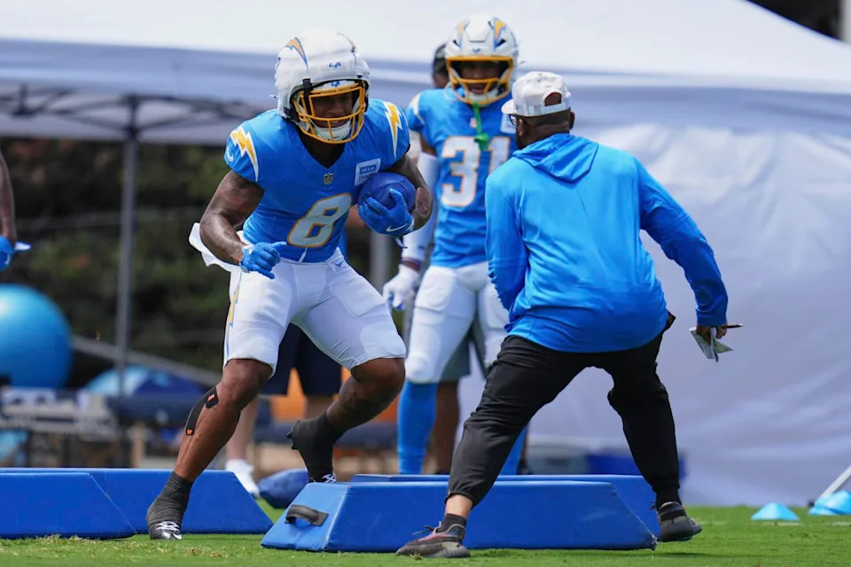 Chargers running back Omarion Hampton runs through a drill during training camp in San Diego on Tuesday.