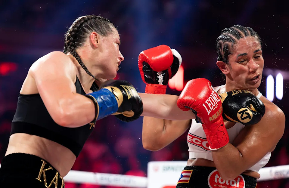 NEW YORK, NEW YORK - JULY 11: Katie Taylor punches Amanda Serrano in their undisputed IBF, WBA, WBC, WBO, and Ring super lightweight championship bout during Netflix's Katie Taylor vs Amanda Serrano 3 at Madison Square Garden on July 11, 2025 in New York City. (Photo by Al Bello/Getty Images for Netflix)