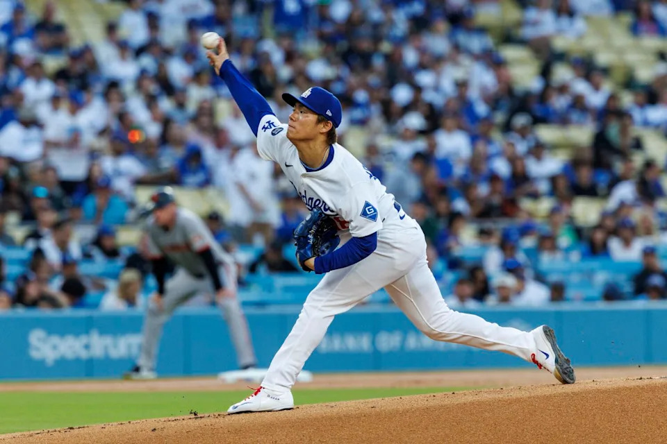 Dodgers pitcher Yoshinobu Yamamoto delivers against the San Francisco Giants on June 13.