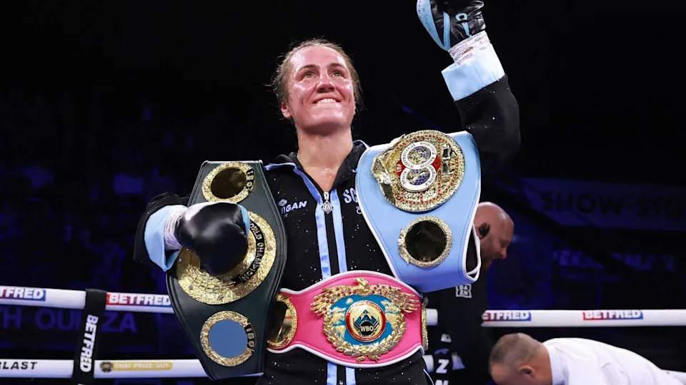 Boxing - Ellie Scotney v Mea Motu - IBF & WBO World Super Bantamweight Titles - Motorpoint Arena Nottingham, Nottingham, Britain - January 25, 2025 Ellie Scotney celebrates with the belts after winning her fight against Mea Motu Action Images via Reuters/Andrew Boyers