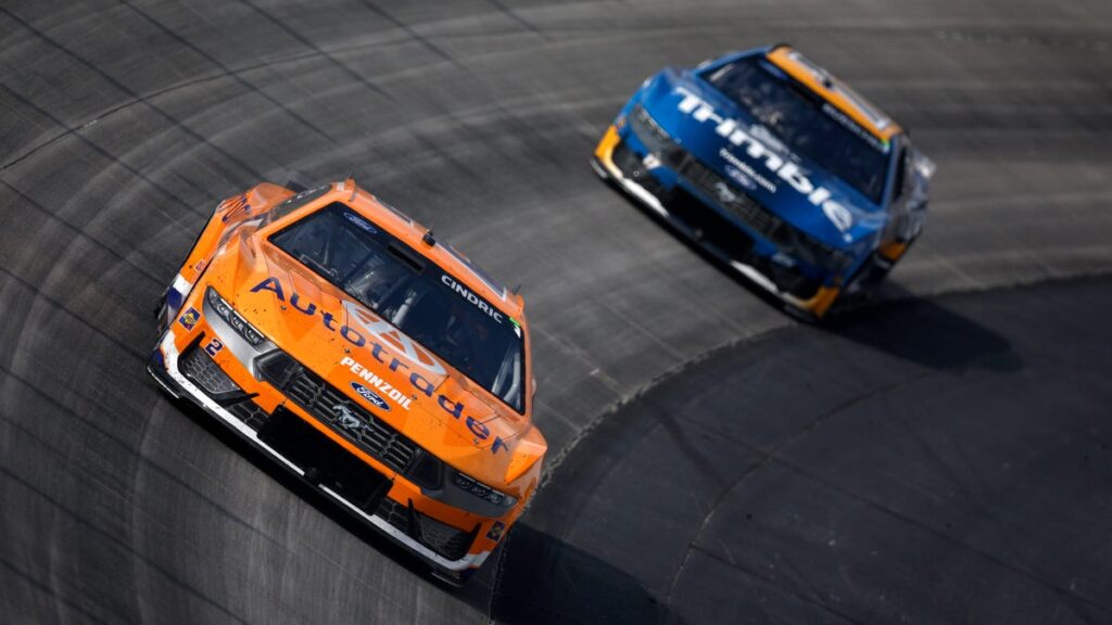 Rain delays NASCAR race at Dover with 14 laps left, Denny Hamlin leading