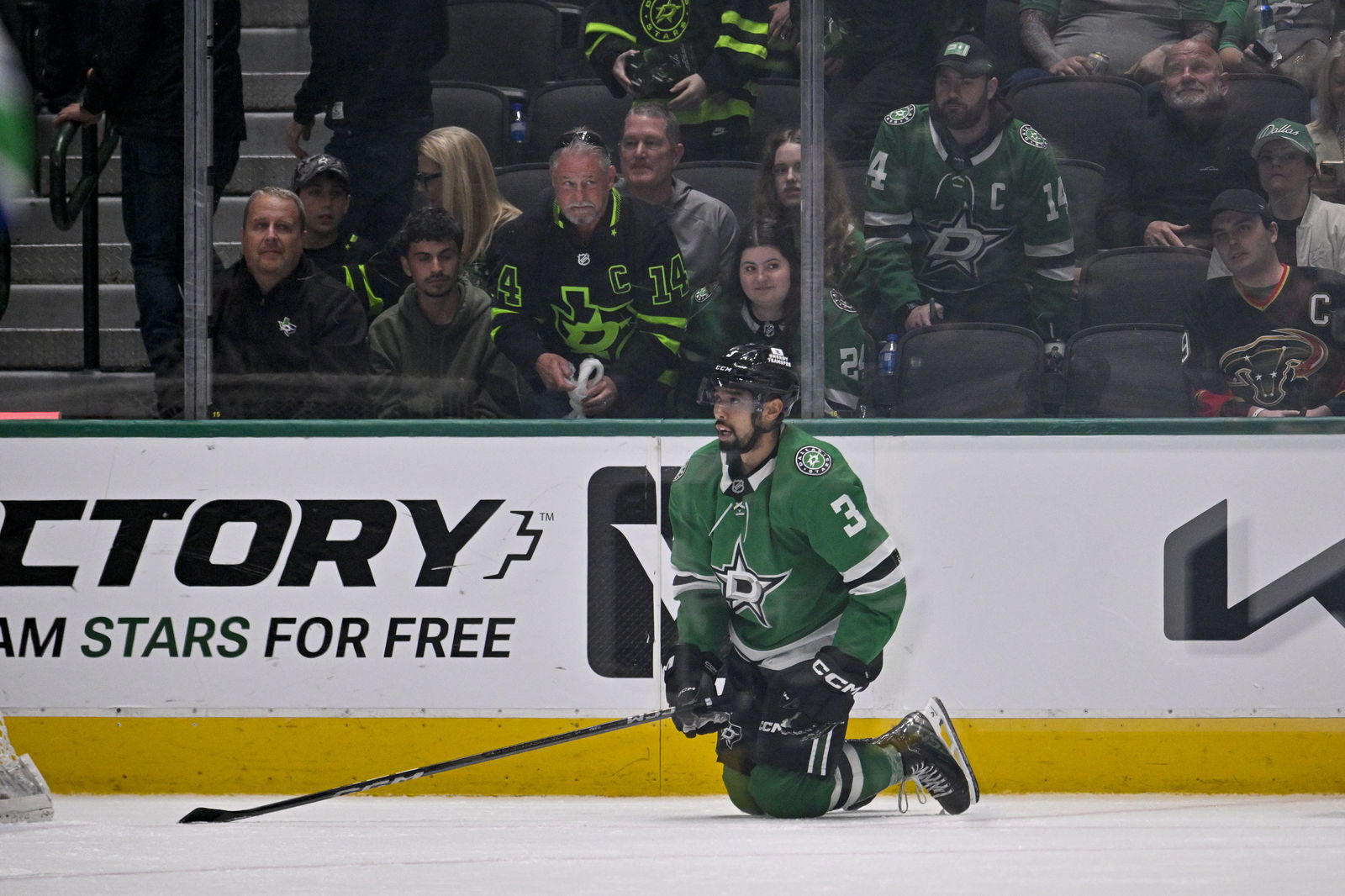 Apr 8, 2025; Dallas, Texas, USA; Dallas Stars defenseman Matt Dumba (3) looks on as the Vancouver Canucks celebrate the victory over the Stars in the overtime period at the American Airlines Center. Mandatory Credit: Jerome Miron-Imagn Images