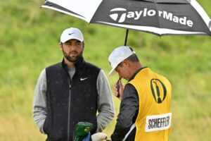 Soaked Scheffler battles elements to make solid British Open start