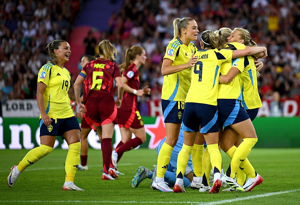 Sweden celebrate Smilla Holmberg's second goal against Germany