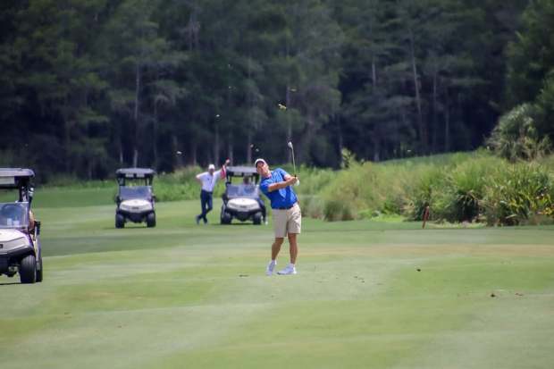 UF golf coach JC Deacon hits a wedge shot during the final round of the 2025 Florida Open en route to his third victory in the prestigious event in its 79th year. (Danielle Boucher/Florida State Golf Association)