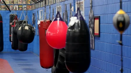 Former world champion rushed to hospital following collision