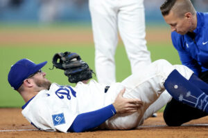 Dodgers All-Star candidate Max Muncy helped off field with knee injury, team ‘optimistic’ it’s only a sprain