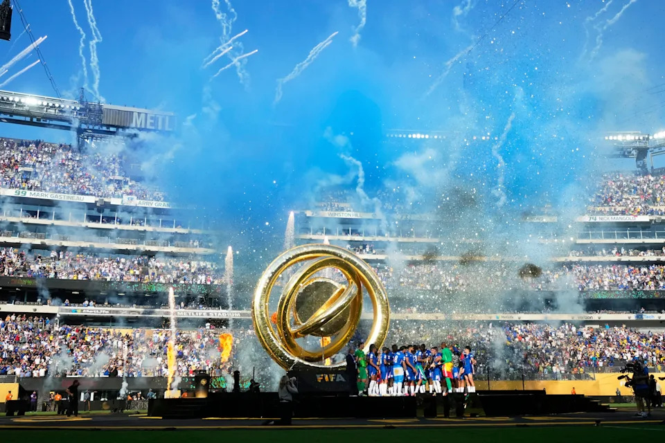 EAST RUTHERFORD, NEW JERSEY - JULY 13: Chelsea FC players lifts the FIFA Club World Cup trophy after the FIFA Club World Cup 2025 final match between Chelsea FC and Paris Saint-Germain at MetLife Stadium on July 13, 2025 in East Rutherford, United States. (Photo by Jose Breton/Pics Action/NurPhoto via Getty Images)