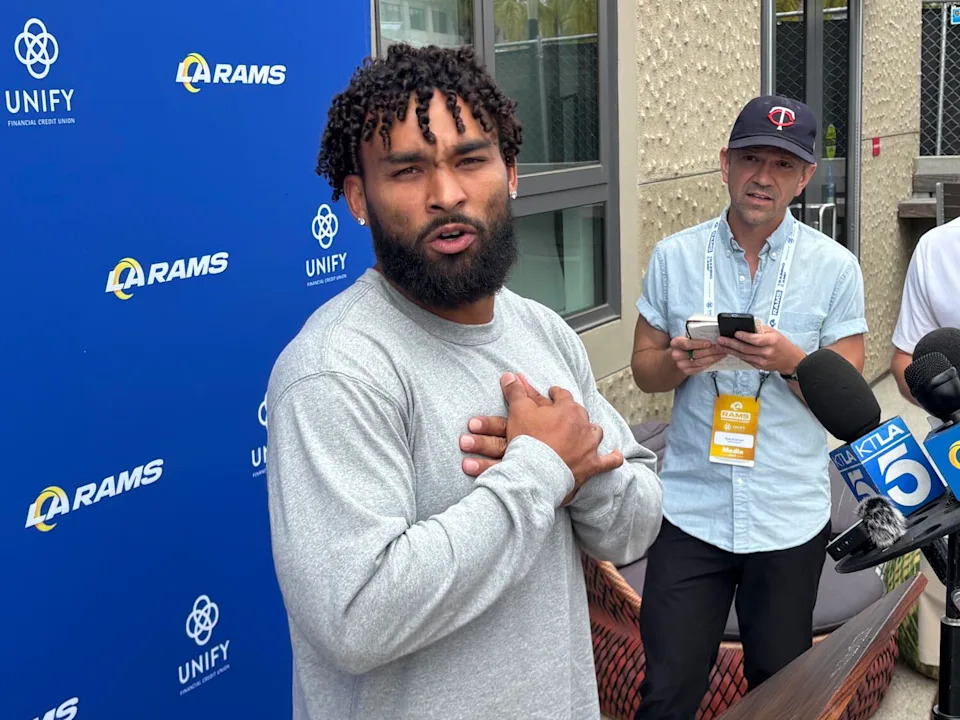 Rams running back Kyren Williams speaks to reporters after arriving at Rams training camp on Tuesday.