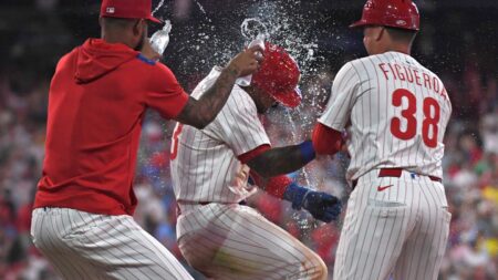 Phillies claim another wild, walk-off win on catcher’s interference with bases loaded in 10th