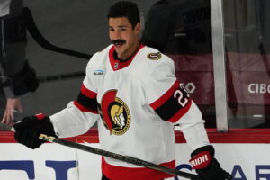 St. Malo's Travis Hamonic Signs in Detroit