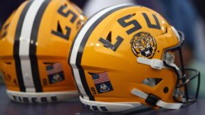 LSU RB JT Lindsey surrenders after warrant alleges he harbored two murder suspects in on-campus dorm
