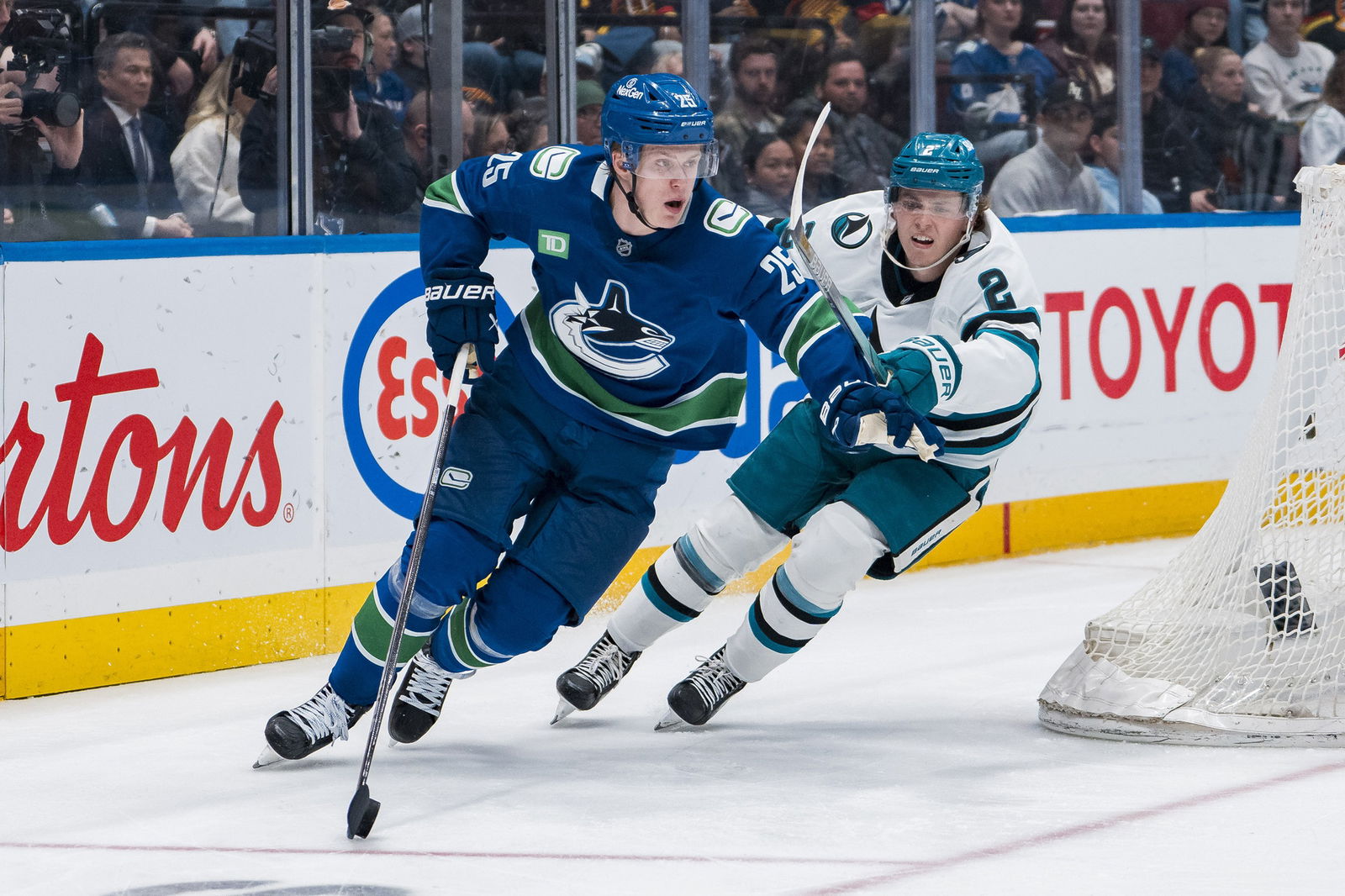 Elias Pettersson and Will Smith (Bob Frid-Imagn Images)