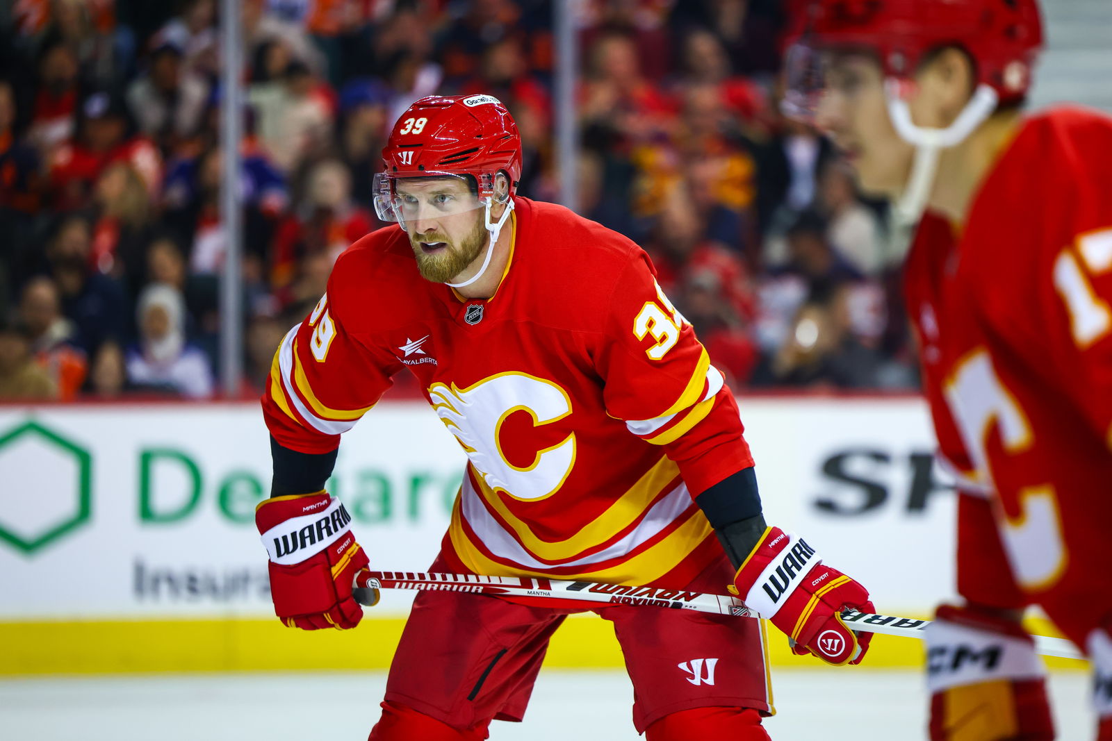 Nov 3, 2024; Calgary, Alberta, CAN; Calgary Flames right wing Anthony Mantha (39) during the face off against the Edmonton Oilers during the second period at Scotiabank Saddledome. Mandatory Credit: Sergei Belski-Imagn Images