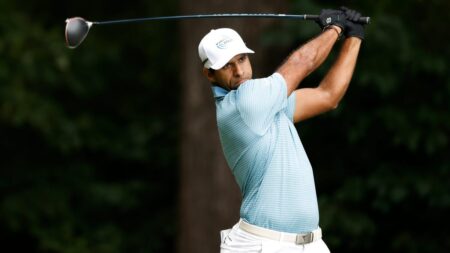 Aaron Rai up two spots to No. 14