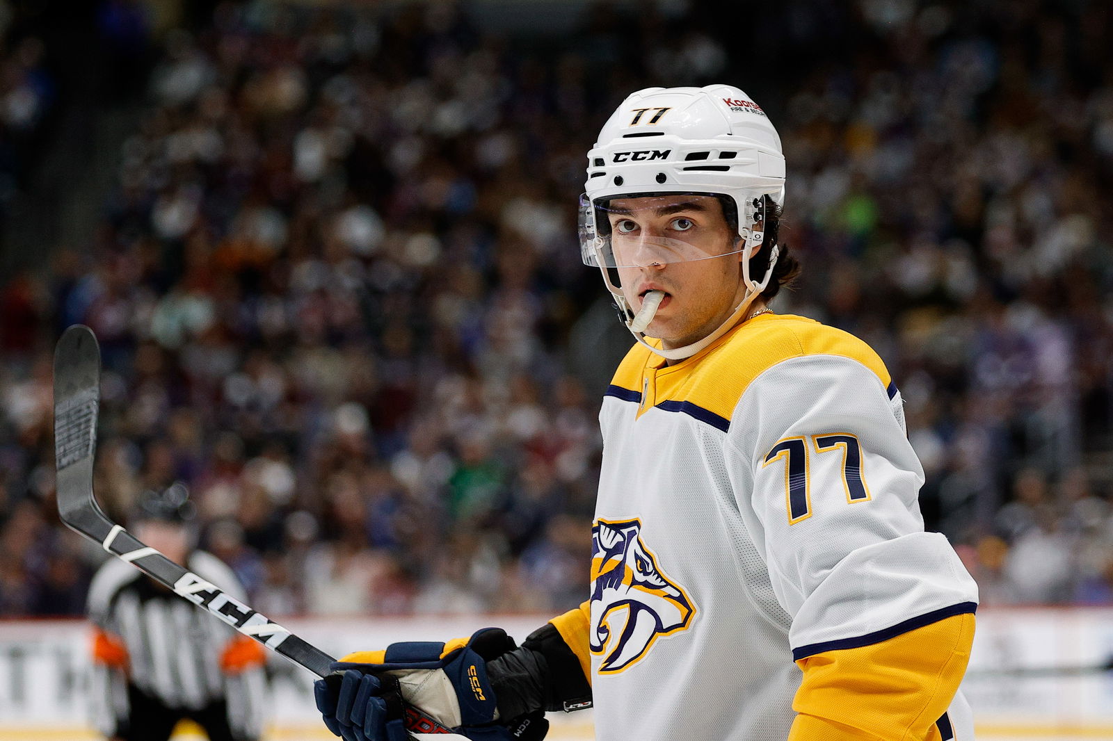 Dec 14, 2024; Denver, Colorado, USA; Nashville Predators right wing Luke Evangelista (77) in the first period against the Colorado Avalanche at Ball Arena. Mandatory Credit: Isaiah J. Downing-Imagn Images