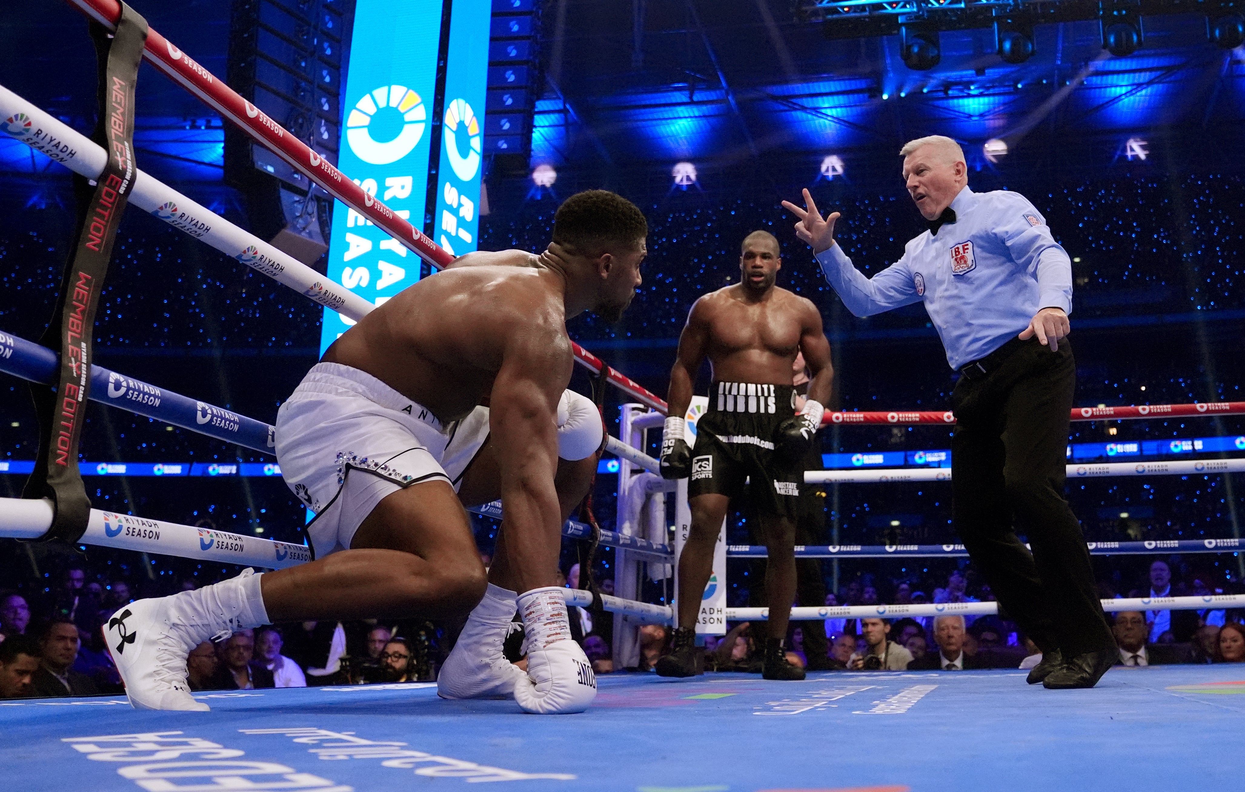 Anthony Joshua (left) was knocked out by Daniel Dubois last time out, in September