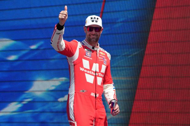 Shane van Gisbergen (88) is introduced before the start of a NASCAR Cup Series auto race in Watkins Glen, N.Y., Sunday, Aug. 10, 2025. (AP Photo/Seth Wenig)