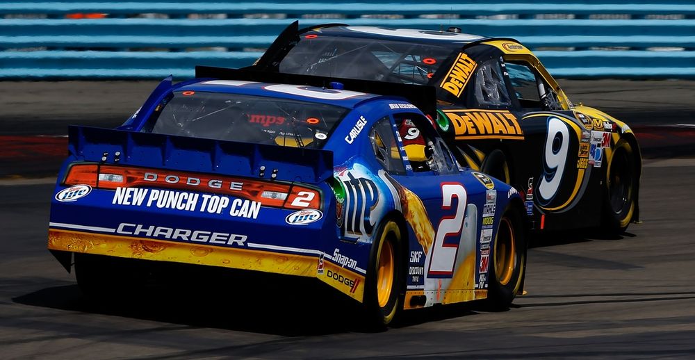 Brad Keselowski, Penske Dodge; Marcos Ambrose, Richard Petty Motorsports Ford