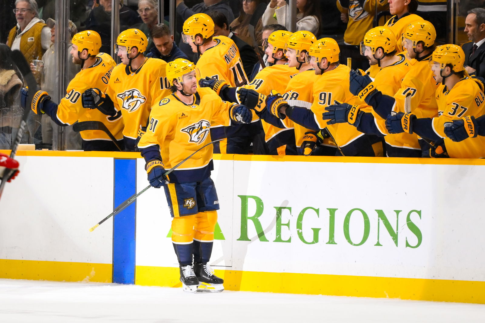 Dec 23, 2024; Nashville, Tennessee, USA; Nashville Predators center Jonathan Marchessault (81) celebrates his goal with his teammates against the Carolina Hurricanes during the second period at Bridgestone Arena. Mandatory Credit: Steve Roberts-Imagn Images