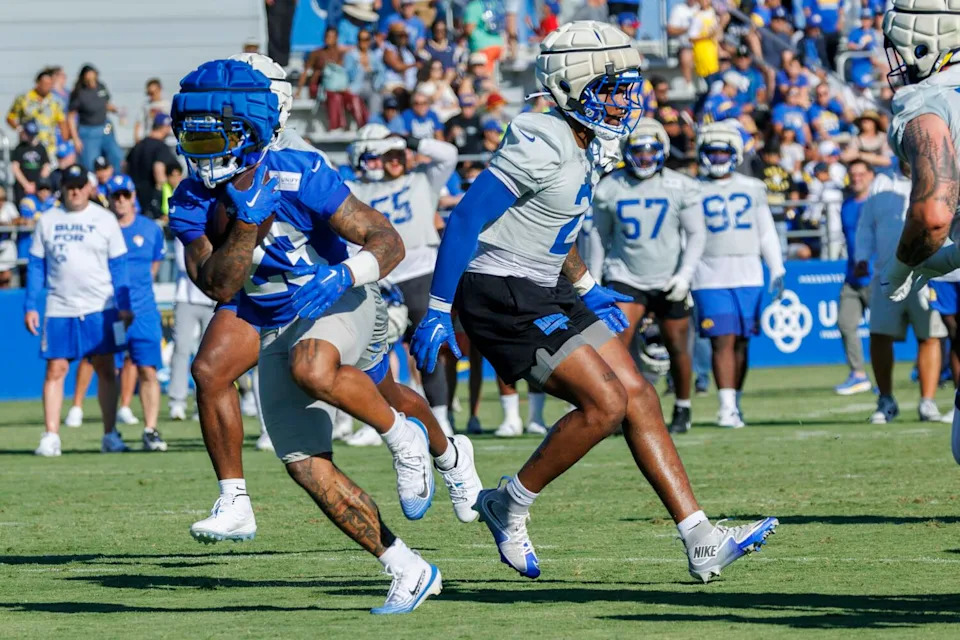 Running back Kyren Williams carries the ball during Rams training camp.
